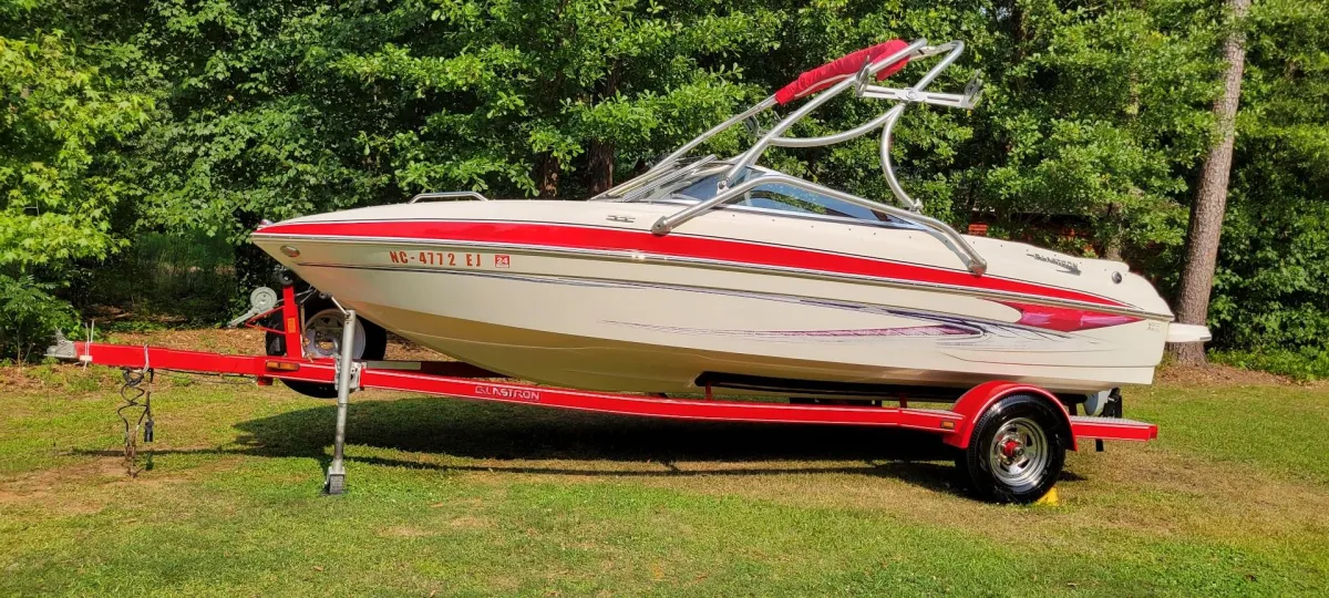 Red boat detailed by Tyree's Auto Detailing.